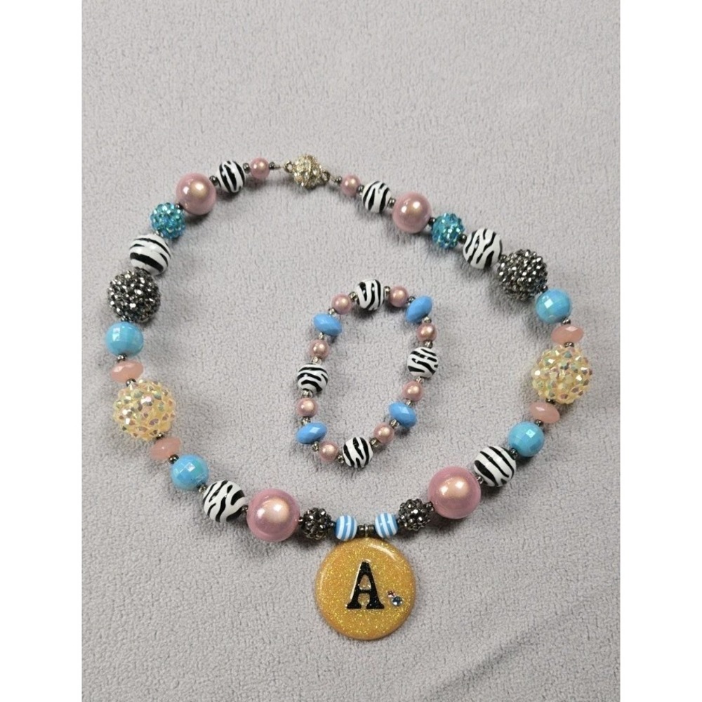 Girls Chunky Beaded Necklace And Matching Bracelet With An "A"